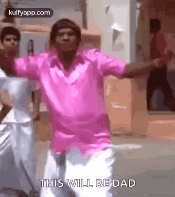 a man in a pink shirt is dancing with his arms outstretched and says `` this will be dad '' .