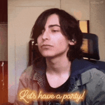 a young man is sitting in a chair with his eyes closed and says let 's have a party .