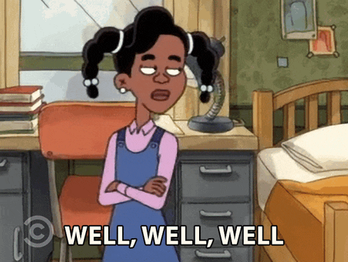 a cartoon girl says well well well in front of a desk