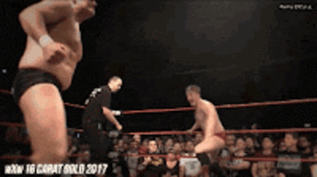 a man in a wrestling ring with the year 2017 on the bottom