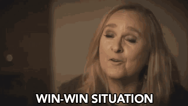 a woman is sitting in a dark room with the words win-win situation written on her face .