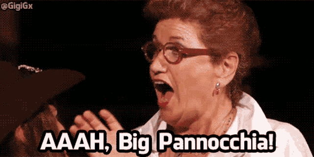 a woman with glasses screams aaah big pannocchia