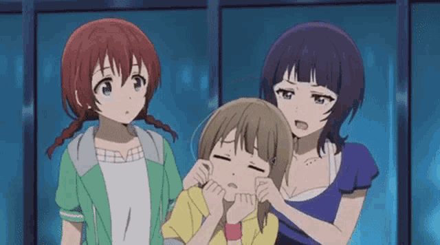 three anime girls are standing next to each other and one of them is making a face .