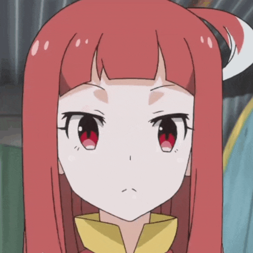 a close up of a cartoon character with red hair and red eyes