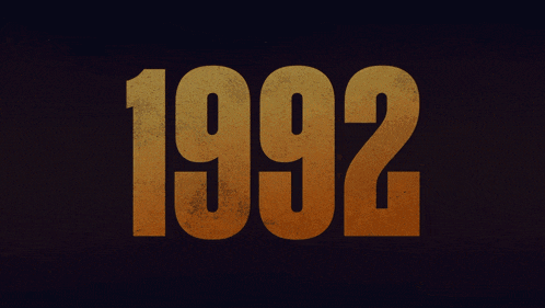 a black background with the year 1992 in gold letters
