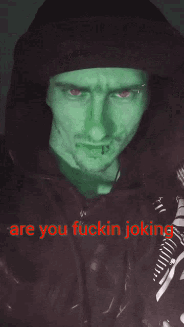 a picture of a man with green eyes and the words are you fuckin joking