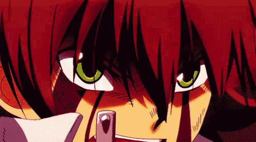 a close up of a person 's face with green eyes