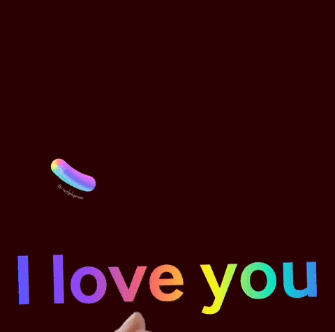 a hand is pointing at a rainbow heart with the words i love you below it