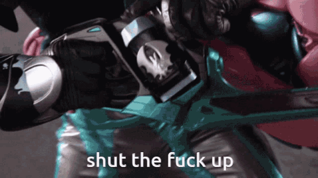 a close up of a person 's arm with the words shut the fuck up above it