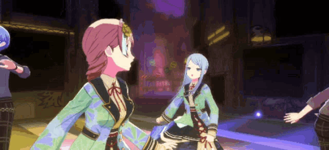a group of anime girls are standing next to each other in a dark room .