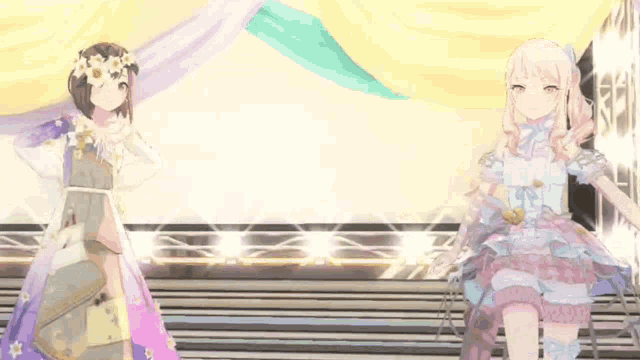 two anime girls are standing next to each other on a stage in front of a yellow curtain .