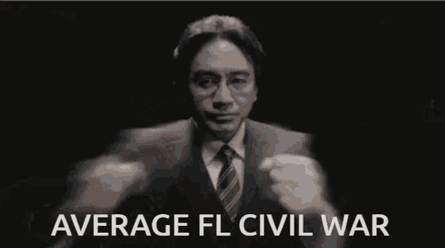 a man in a suit and tie is holding a piece of paper that says average fl civil war .