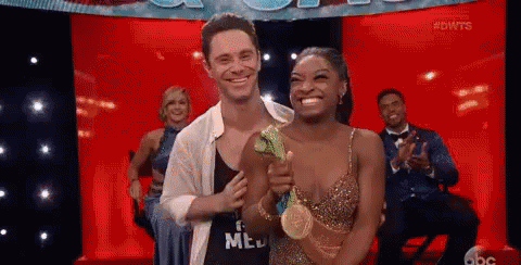 Flash It GIF - Simone Biles Dancing With The Stars Gold Medal GIFs