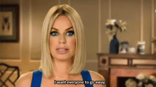 a woman in a blue dress is talking and saying `` i want everyone to go away '' .