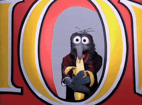 a cartoon character is holding a banana in front of the number 100