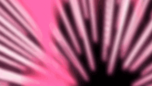 a pink and black striped background with a circular pattern