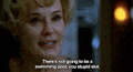 a close up of a woman 's face with a caption that says there 's