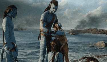 a man in a blue suit holds a child in his arms