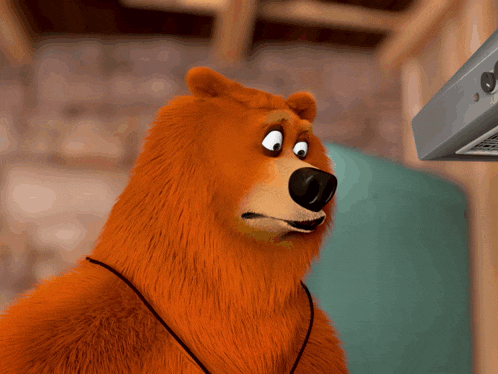 a cartoon bear is reaching out towards a stove hood