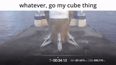 a picture of a rocket with the words whatever go my cube thing on the bottom