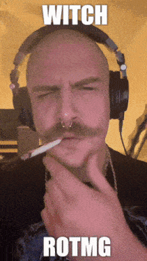 a man with a mustache and headphones is smoking a cigarette with the words witch rotmg above him