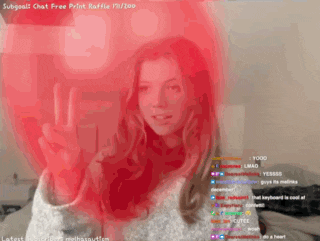 a woman giving a peace sign in front of a red background