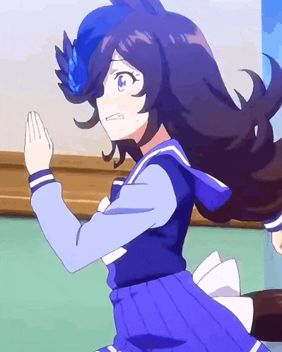a girl with a blue hat and a blue dress