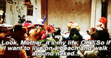 a group of sesame street characters are standing in a room talking