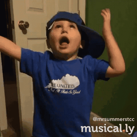 a young boy is wearing a blue shirt that says reunited