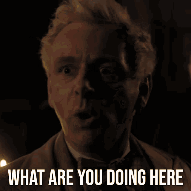 a man in a suit and bow tie is asking what are you doing here