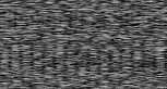 a black and white photo of a gray carpet texture