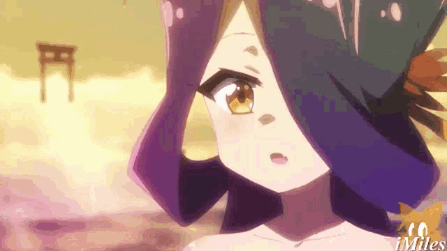 a close up of a girl 's face with the words imiles on the bottom