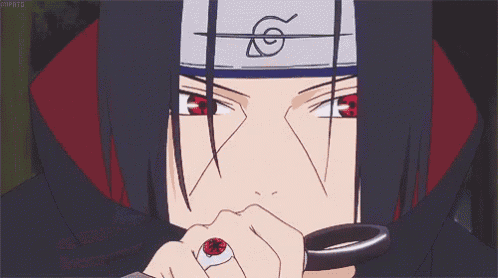 a close up of a person 's face with red eyes and a ring in their hand .