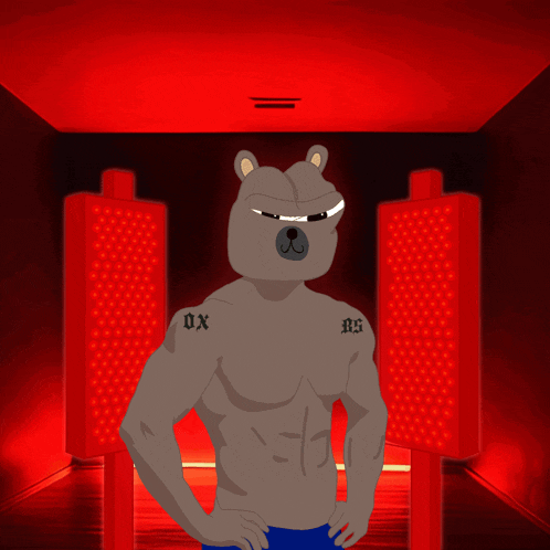 a bear with a tattoo on his arm that says ox on it