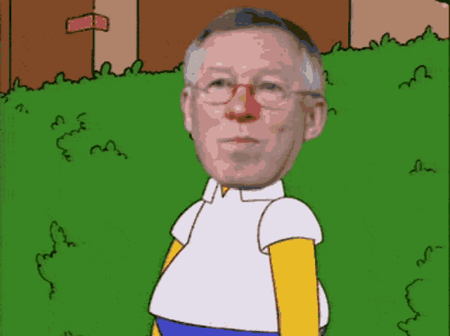 a man with glasses and a red nose is standing in the grass