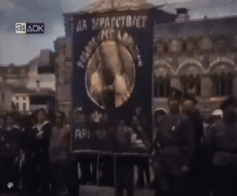 a group of people are gathered around a banner that says da 3kpactbject