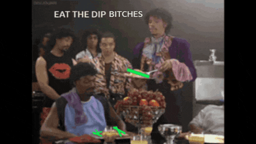 a group of people are gathered around a table with the words " eat the dip bitches " above them