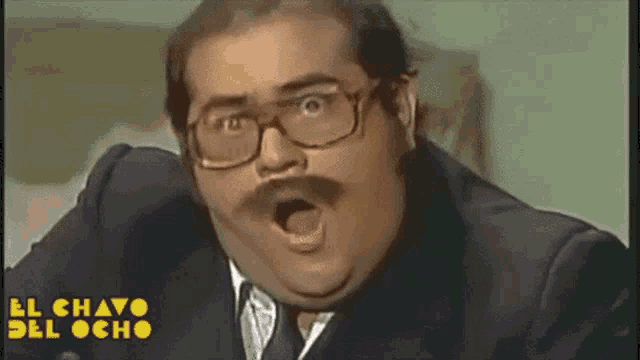 a man with glasses and a mustache has the words el chavo del ocho on the bottom right