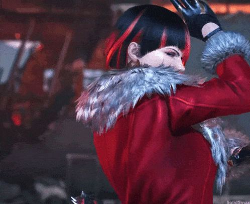 a woman with red and black hair and a fur coat