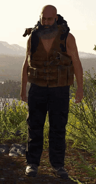 a bald man with a beard wears a brown vest