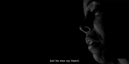 a black and white photo of a woman 's face with the words `` but he was my heart '' written below it .