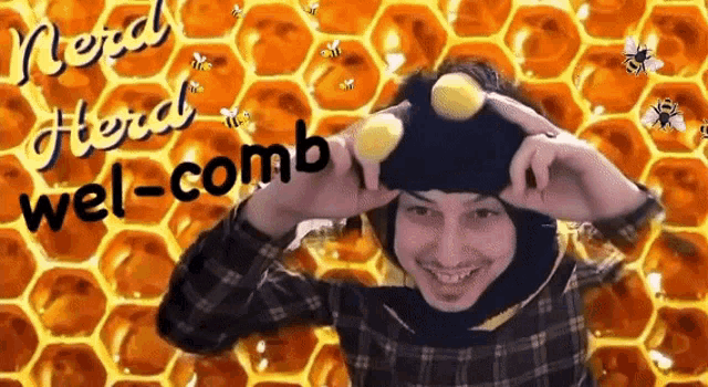 a man wearing a bee hat with the words nerd wel-comb