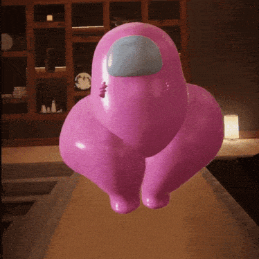 a pink among us character with a blue face