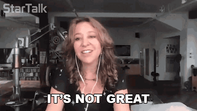a woman says it 's not great while wearing earphones