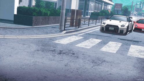 a white sports car with a license plate that says ' a ' on it drives down a street