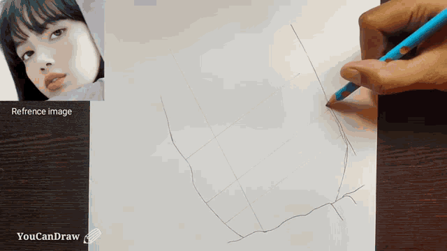a person is drawing a picture of a woman on a piece of paper with the words reference image below it