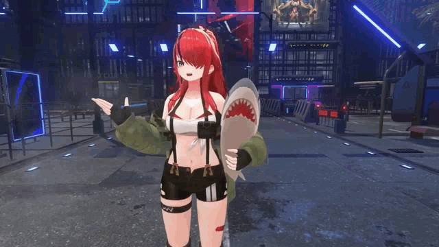 a girl with red hair is holding a shark