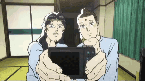 two cartoon characters are taking a selfie with a camera .