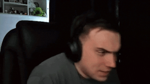 a man wearing headphones is saying evelone
