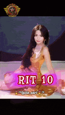 a woman in a gold dress sits on a bed with rit 10 written in red